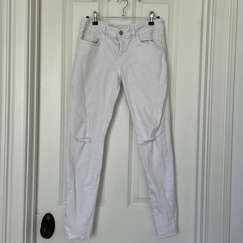 3/$5 Ripped white skinny jeans size 27